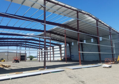 Anderson Hay steel structure roofing being added