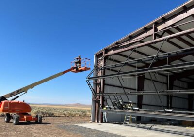 Oregon Pacific Construction putting up a hanger door