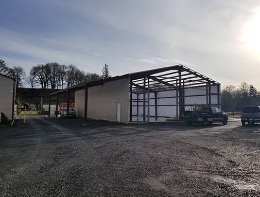 Steel agricultural building partially complete